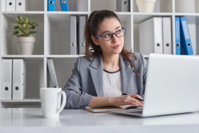 Thoughtful intern working in office