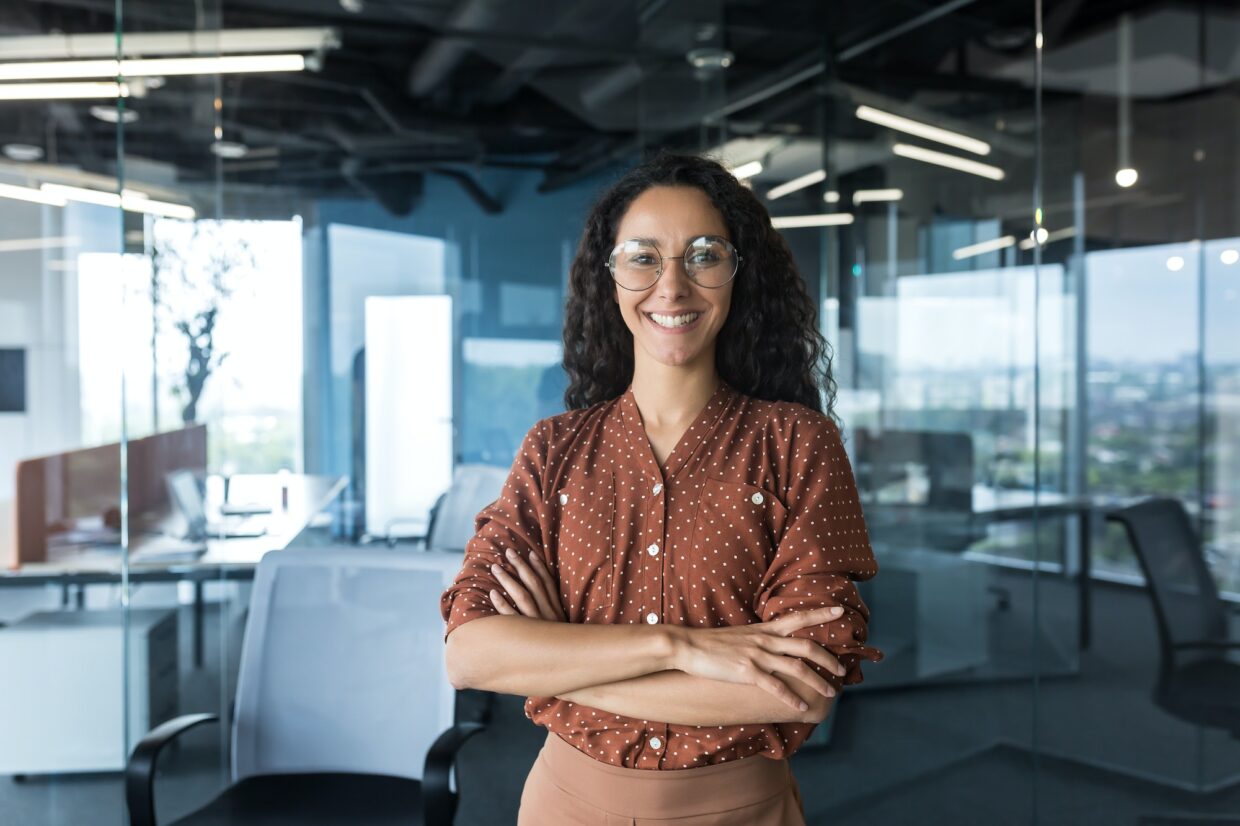 Young successful Indian IT developer female engineer working inside the office of a development