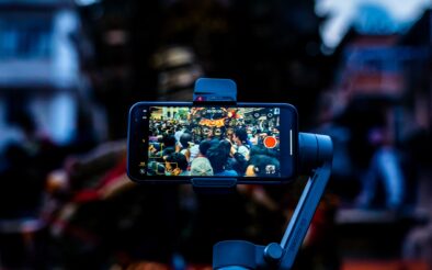 people using mobile technology to taking photos during chariot festival.